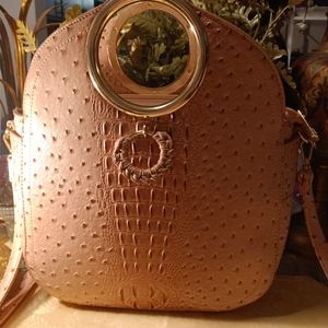 Elegant Pink Handbag with Gold Accents